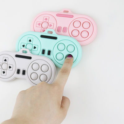 Продукты прорезывания зубов младенца - игрушки teethers силикона формы регулятора игрока мультфильма Washable различных цветов изготовленные на заказ милые