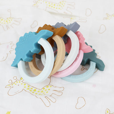 Игрушка Teether младенца силикона мультфильма с формой енота единорога пингвина