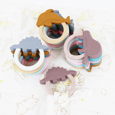 Игрушка Teether младенца силикона мультфильма с формой енота единорога пингвина