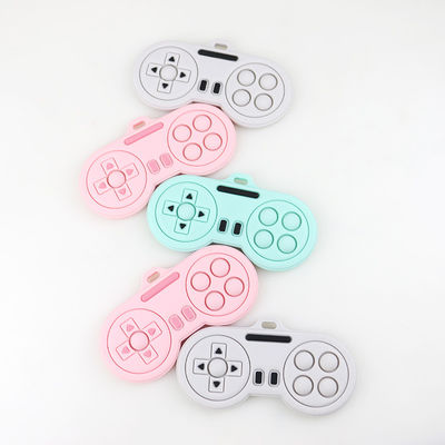 Продукты прорезывания зубов младенца - игрушки teethers силикона формы регулятора игрока мультфильма Washable различных цветов изготовленные на заказ милые
