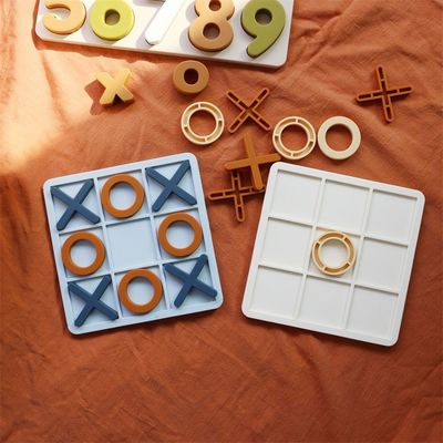 MOQ 50 комплектов Силиконовый XO Tic Tac Toe Puzzle Настраиваемый логотип Цвета BPA Бесплатное сертификат CE Силиконовые игрушки